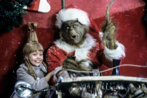 Jim Carrey ‘Freaked Out’ and ‘Called Cut’ When ‘Grinch’ Stunt Almost Hurt Child Co-Star Taylor Momsen: ‘I Always Felt Really Safe With Jim’